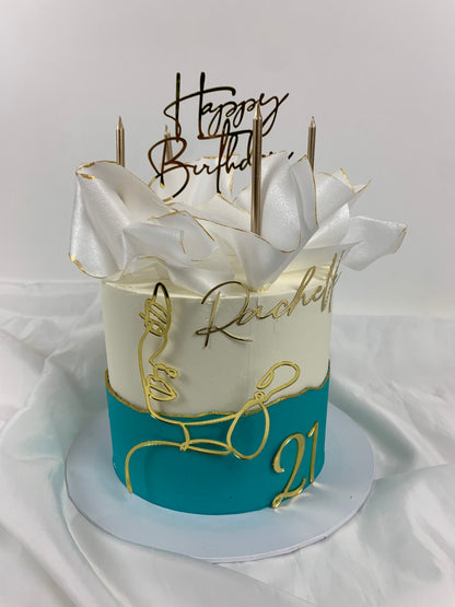 Mini cake with acrylic face deco